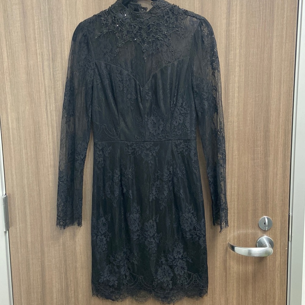 Nikibiki Black Lace dress with floral detail.